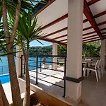 Beachfront With Private Pool In Holiday home Vela Luka